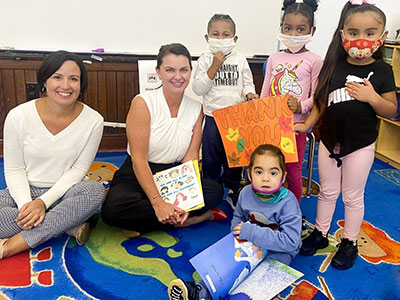 PeoplesBank’s Cindy Wszolek, cash management officer, and Chrissy Kiddy vice president corporate responsibility and social media marketing, read to the children of Square One. The nonprofit is one of many organizations supported by record donations by PeoplesBank in 2022.